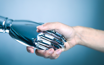 Confianza en la inteligencia artificial: mano robot toma una mano humana